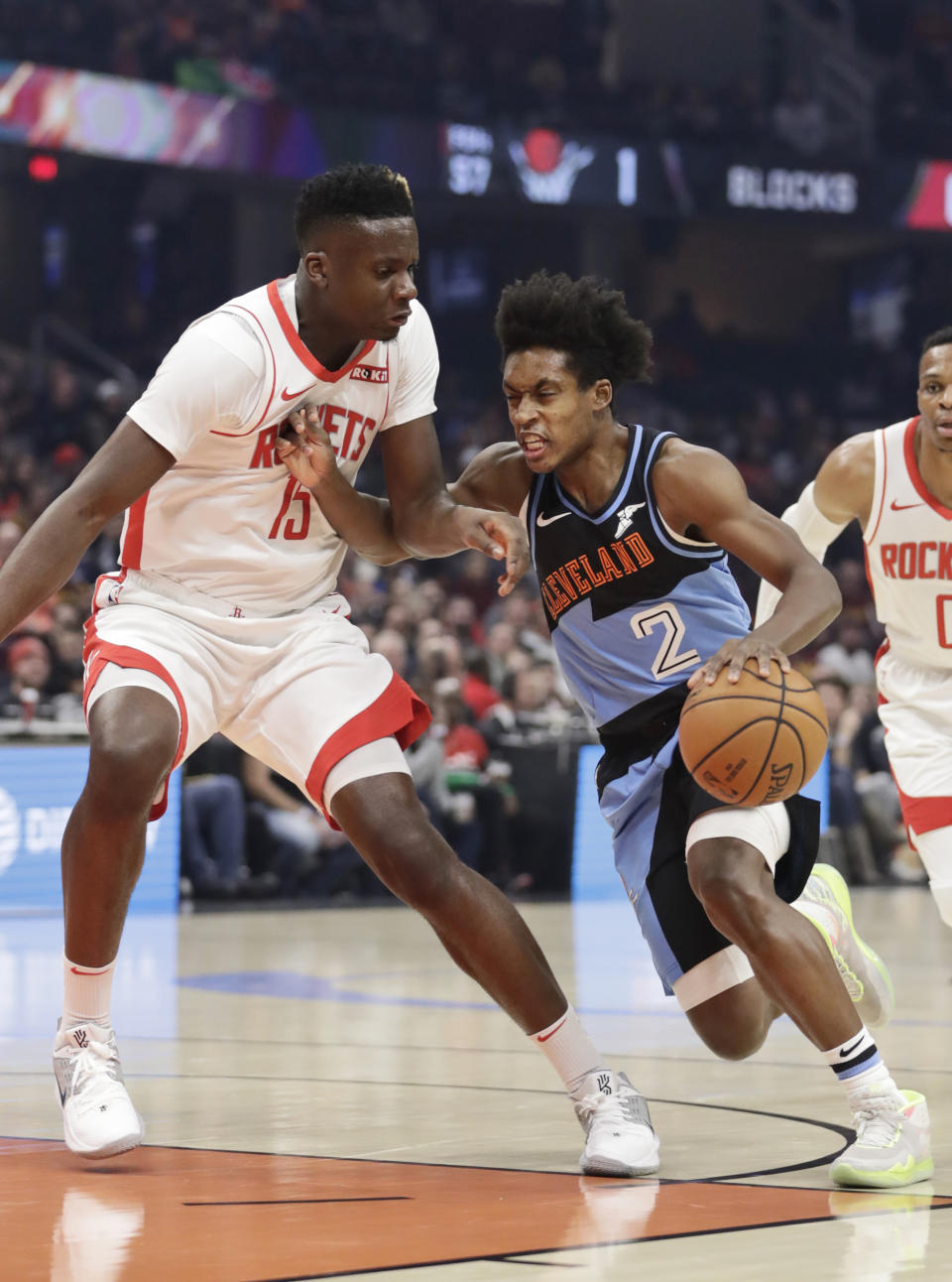 Cleveland Cavaliers' Collin Sexton (2) drives past Houston Rockets' Clint Capela (15) in the first half of an NBA basketball game, Wednesday, Dec. 11, 2019, in Cleveland. (AP Photo/Tony Dejak)