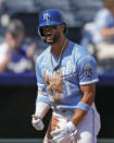 Kansas City Royals' MJ Melendez celebrates after hitting an RBI triple during the third inning of a baseball game against the Cleveland Guardians Monday, Sept. 18, 2023, in Kansas City, Mo. (AP Photo/Charlie Riedel)