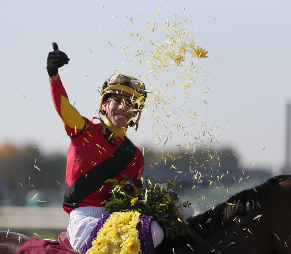 Jockey Irad Ortiz, Jr. celebrates in the winner's circle. Nov. 3, 2018