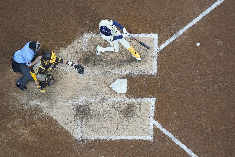 Milwaukee Brewers' Blake Perkins gets an RBI hit during the eighth inning of a baseball game against the San Diego Padres Wednesday, April 17, 2024, in Milwaukee. (AP Photo/Morry Gash)