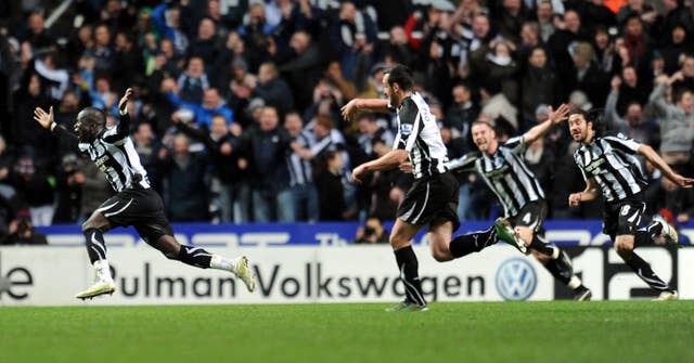 Cheick Tiote, left, celebrates after completing Newcastle’s stunning comeback against Arsenal in 2011
