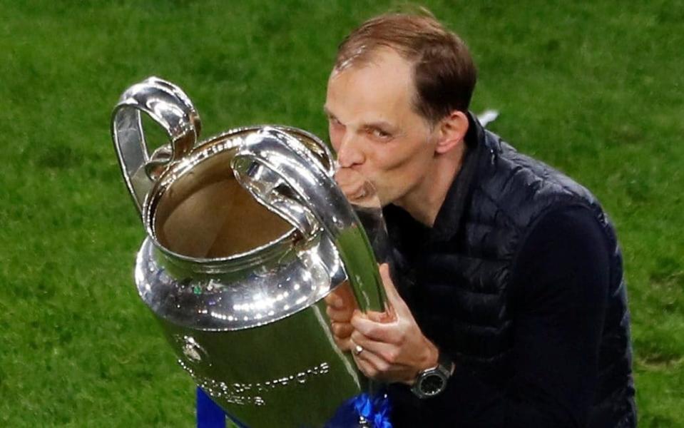 Chelsea manager Thomas Tuchel celebrates with the trophy after winning the Champions League - Reuters