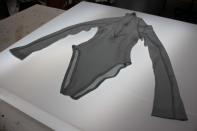 London university graduate, Rosie Broadhead, integrates live bacteria into the fibres of "Skin II" bodysuit in London