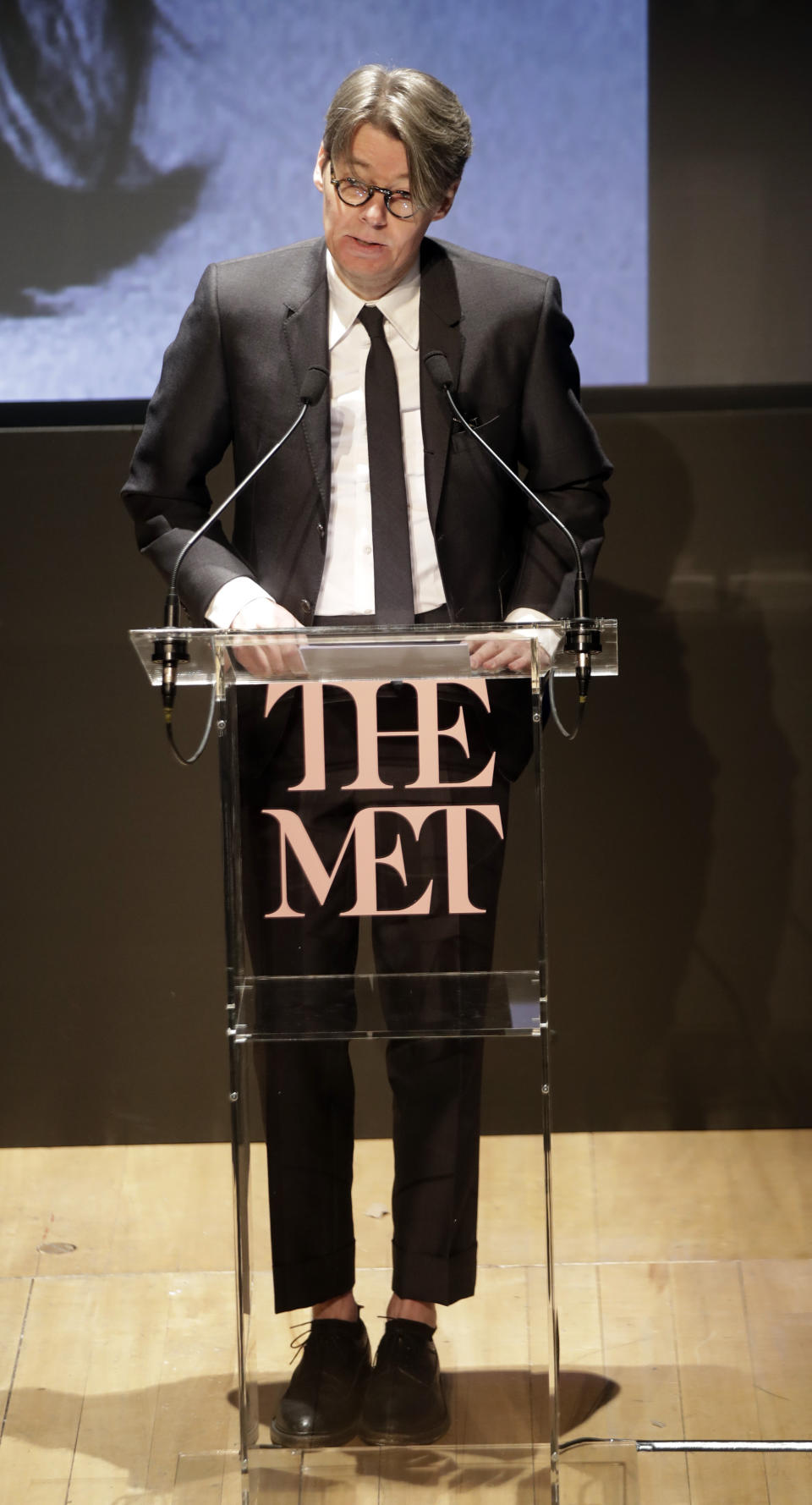 Andrew Bolton curator in charge of MOMA presents this year's Costume Institute exhibition titled ''Camp: Notes on Fashion,'' at the Teatro Gerolamo, in Milan, Italy, Friday, Feb. 22, 2019. The exhibition will be shown at the Metropolitan Museum of Art of New York, from May 9-Sept. 8, 2019. (AP Photo/Luca Bruno)