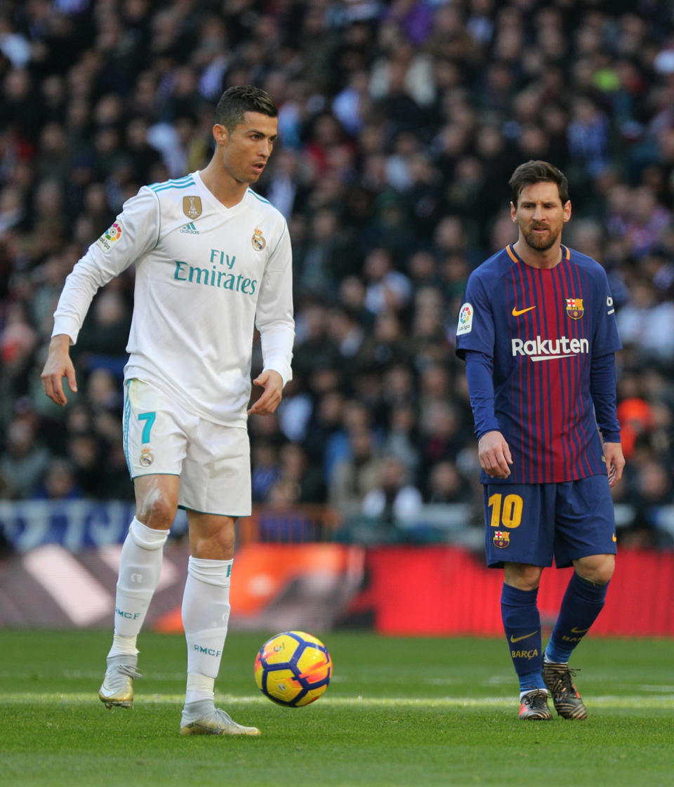 <p>Soccer Football – La Liga Santander – Real Madrid vs FC Barcelona – Santiago Bernabeu, Madrid, Spain – December 23, 2017 Real Madrid’s Cristiano Ronaldo in action with Barcelona’s Lionel Messi REUTERS/Sergio Perez </p>