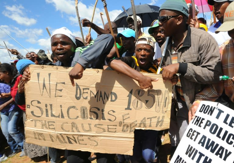 The settlement will cover those who worked for the mining giants between March 1965 and the present day and will reportedly benefit up to 100,000 former mine workers or their dependents