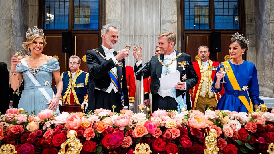 Queen Maxima at banquet raising toast with King Willem-Alexander, King Felipe and Queen Letizia