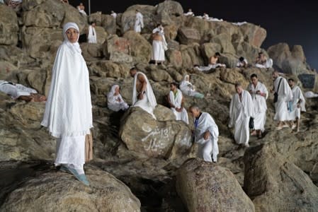 Muslim pilgrims gather on Mount Mercy on the plains of Arafat during the annual haj pilgrimage