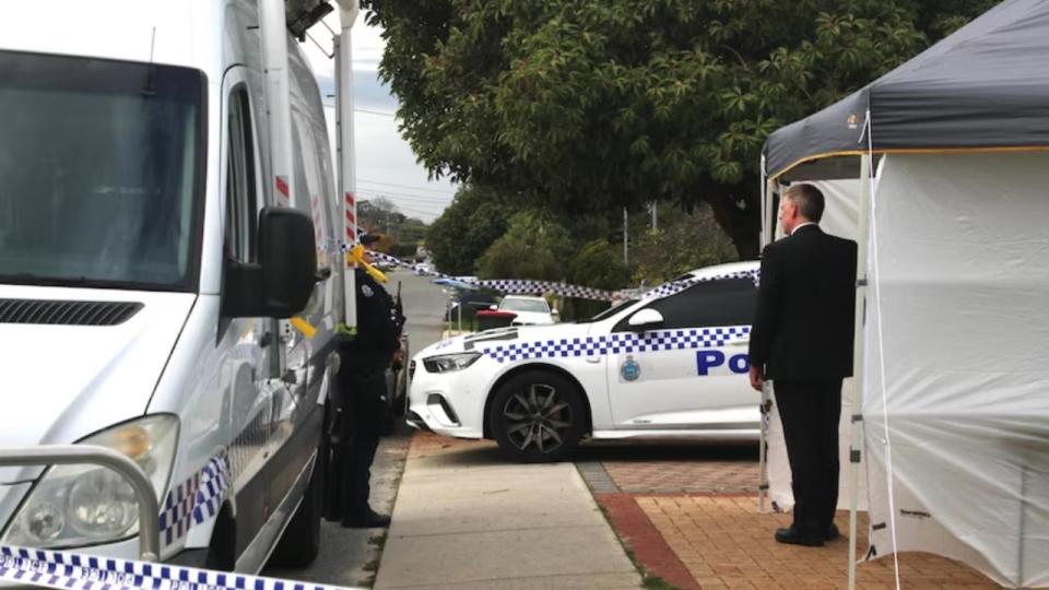 Police outside Tiffany Woodley’s home where they found her body unresponsive and servereley injured in August last year.