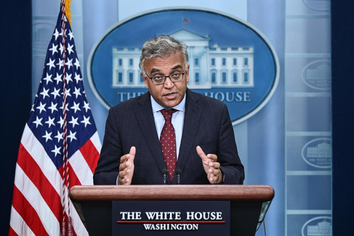 White House COVID-19 response coordinator Dr. Ashish Jha stands at a White House podium.