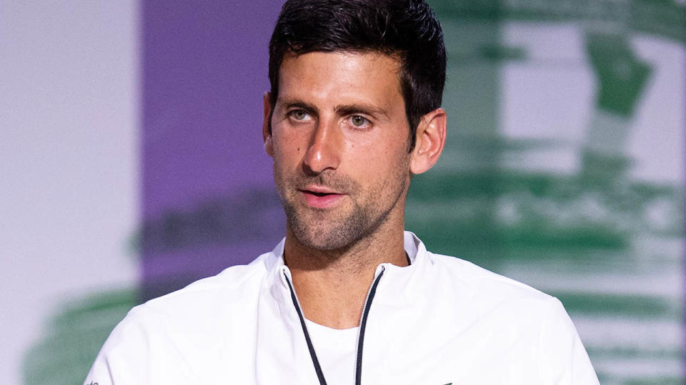 Novak Djokovic addresses the media at Wimbledon. (Image: FLORIAN EISELE/AFP/Getty Images)