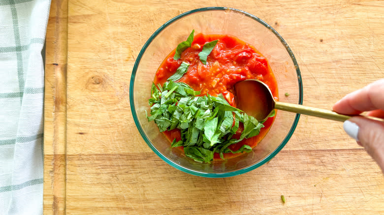 basil and tomatoes in bowl