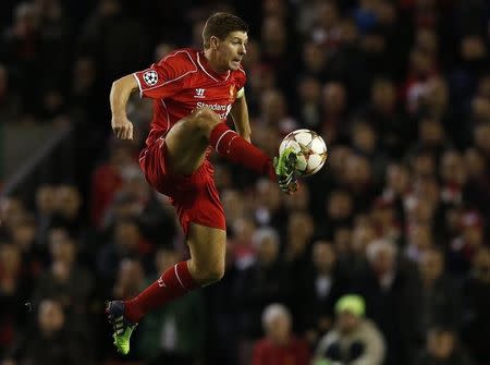 Liverpool's Steven Gerrard controls the ball during their Champions League Group B soccer match against FC Basel at Anfield in Liverpool, northern England, December 9, 2014. REUTERS/Phil Noble