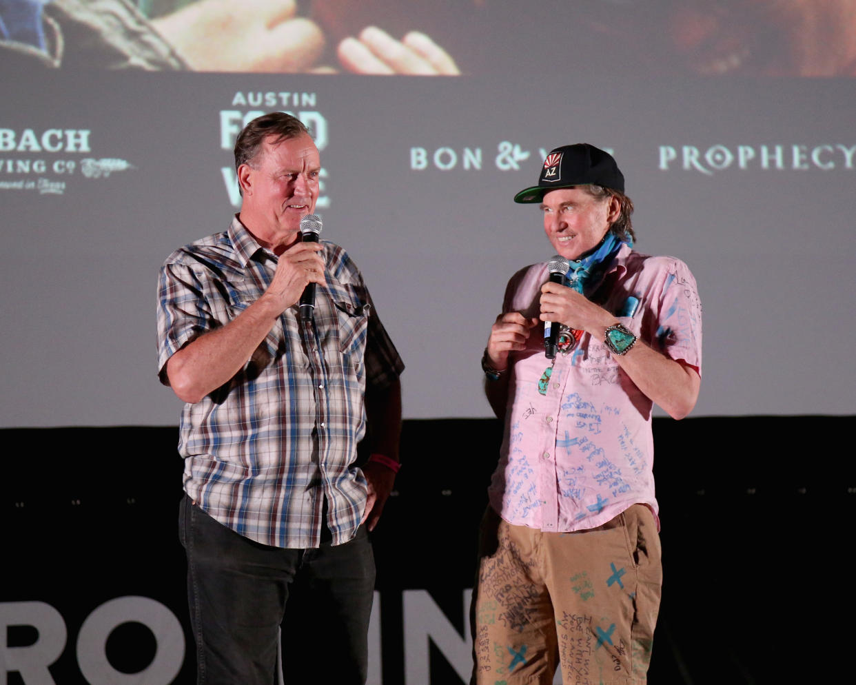 AUSTIN, TEXAS - SEPTEMBER 01:  Val Kilmer who played Iceman and Barry Tubb who played Wolfman in the film, introduce a special screening of Top Gun at Camp Mabry on September 1, 2019 in Austin, Texas.  (Photo by Gary Miller/Getty Images)