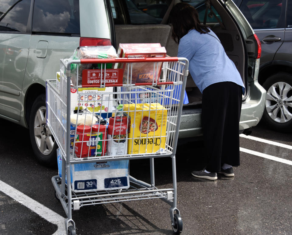 Miami, Florida, residents stock up on groceries at a Costco on August 29, 2019, as they prepare for Hurricane Dorian. - Dorian was gathering strength on Thursday as it churned towards Florida, where it could make landfall as a powerful Category 4 storm. Florida's governor declared a state of emergency, warning residents on the east coast of the "Sunshine State" to prepare for a potentially major hurricane. (Photo by Michele Eve Sandberg / AFP)        (Photo credit should read MICHELE EVE SANDBERG/AFP via Getty Images)