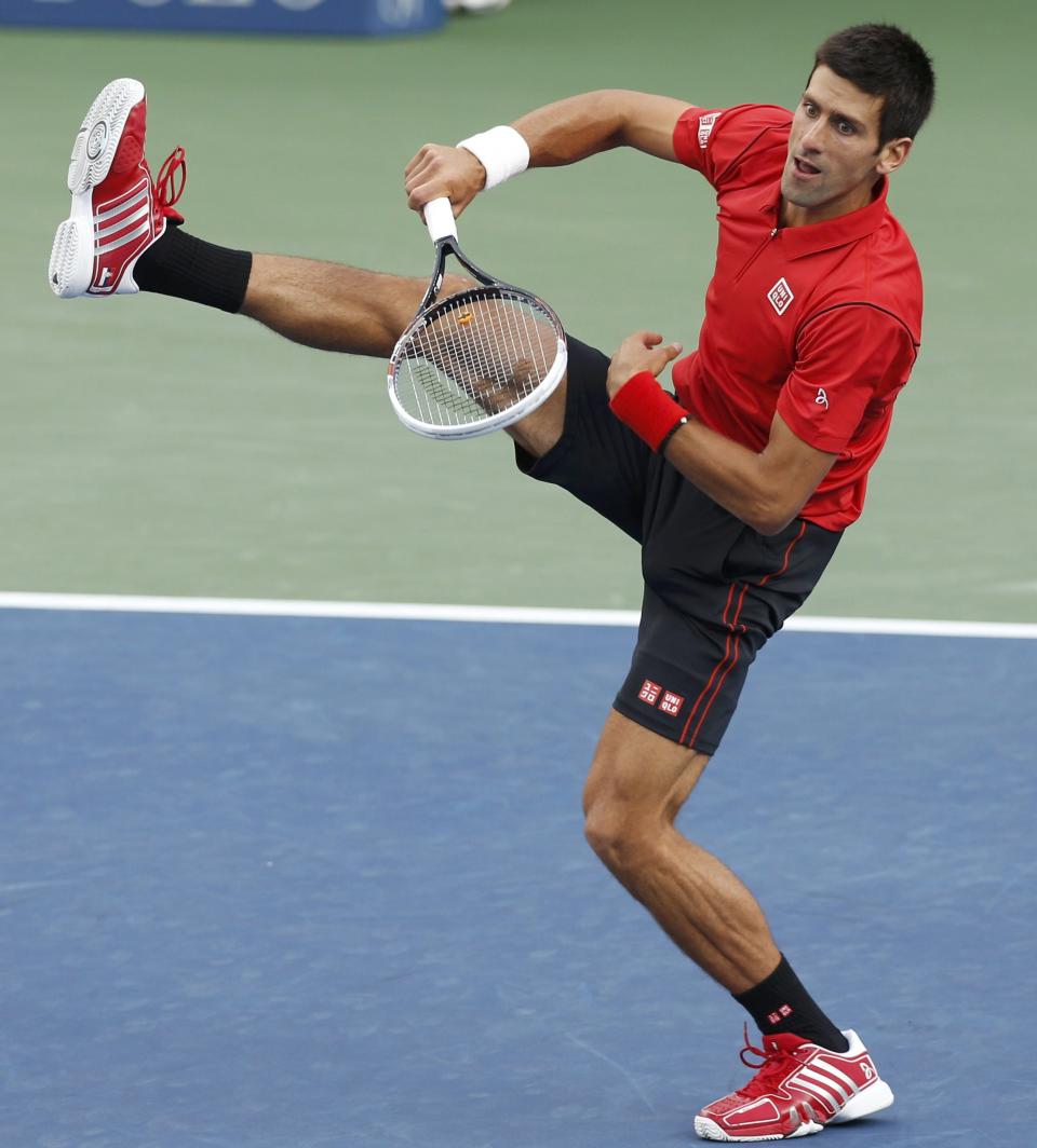 Djokovic of Serbia serves to Nadal of Spain during their men's final match at the U.S. Open tennis championships in New York