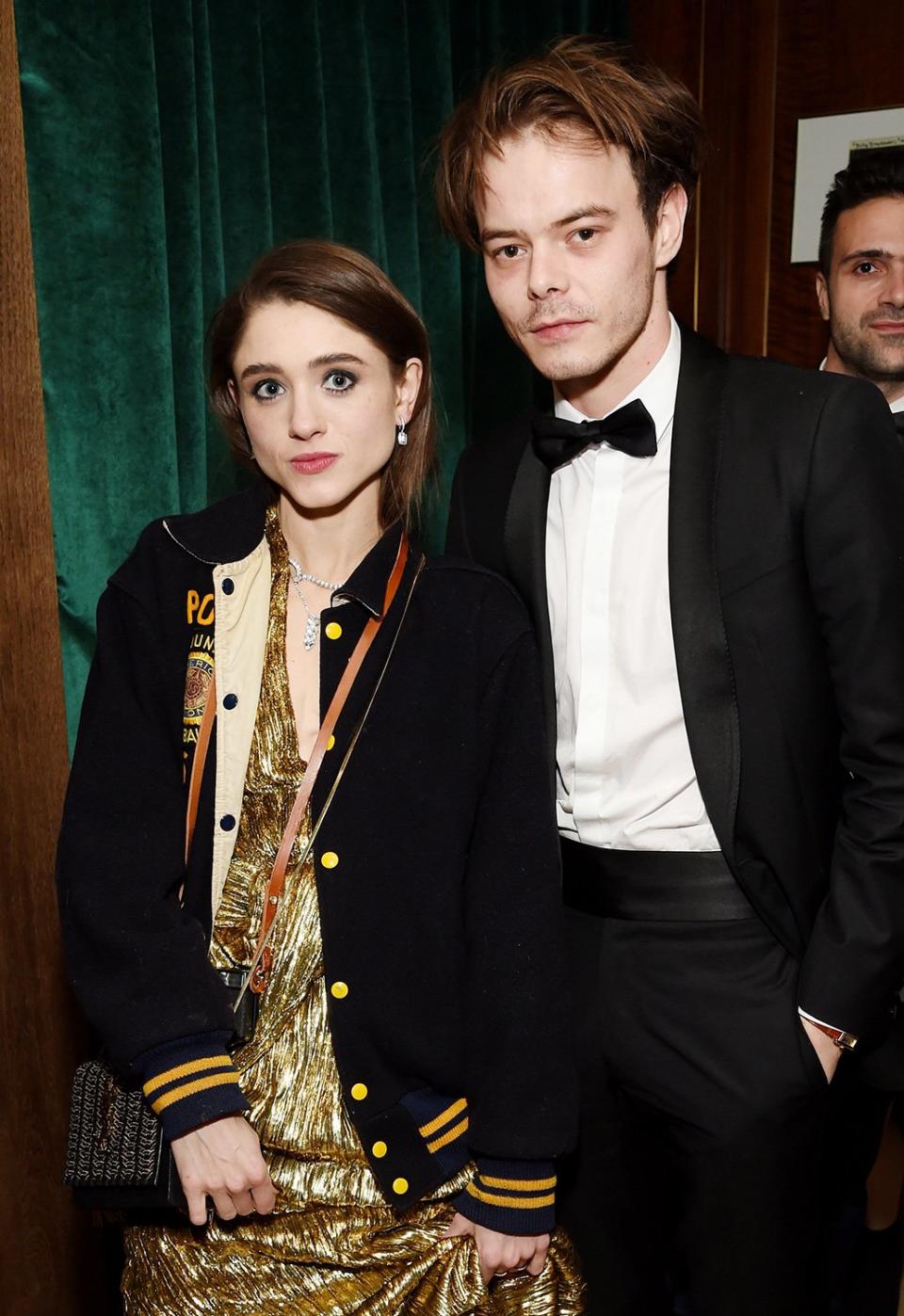 Natalia Dyer added a varsity jacket to her glam get-up and hit the Netflix after-party with boyfriend and <em>Stranger Things </em>costar, Charlie Heaton. 