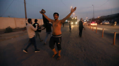 Iraqi demonstrators gather during an anti-government protest in front of the Governorate building in Basra, Iraq December 14, 2018. REUTERS/Essam al-Sudani