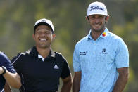 Xander Schauffele, left, and Max Homa laugh on the 12th tee during the first round of the U.S. Open Golf Championship, Thursday, June 17, 2021, at Torrey Pines Golf Course in San Diego. (AP Photo/Marcio Jose Sanchez)