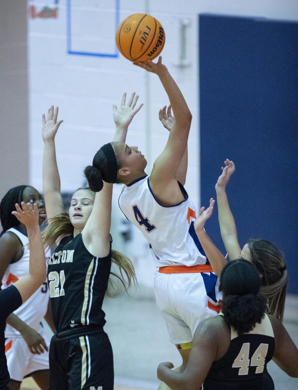 (4) shoots during the Milton v Escambia girls basketball game at Escambia High School in Pensacola on Thursday, Jan. 6, 2022.