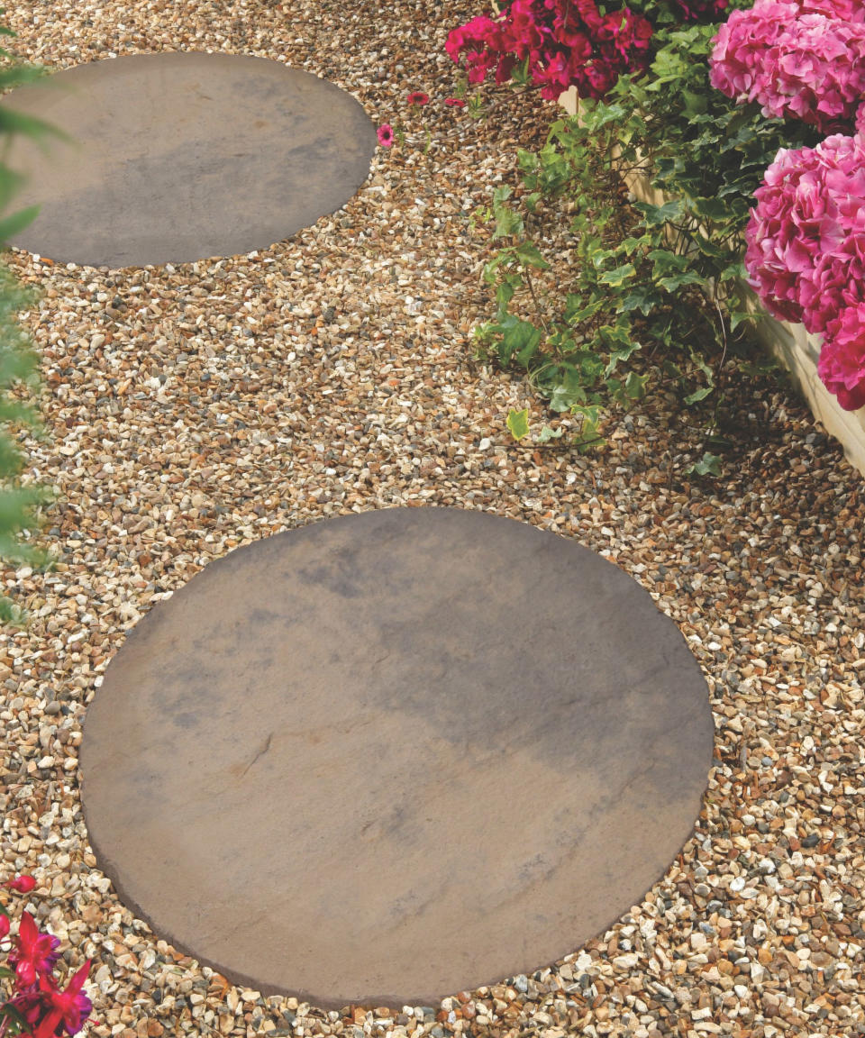 <p> Informal stepping stones will give a relaxed look to any garden. One of the best things is that their circular shape means they feel very natural when used as a cheap DIY garden path. </p> <p> Stepping stones can be used easily for transition between different areas of an outdoor space. As they are an understated addition to a garden, they don’t have to impose too heavily on the rest of the design. </p> <p> 'Circular paving stones add character and charm to every space, and are great for smaller gardens as the path doesn't need to take up too much room,' says Rowan Cripps. </p> <p> They are an especially good choice if you want to create an easy route across a muddy area or need to protect your lawn from people walking over it. Plus, as learning how to lay stepping stones is relatively straightforward, this is a quick and easy way to get your new DIY path in place.  </p>