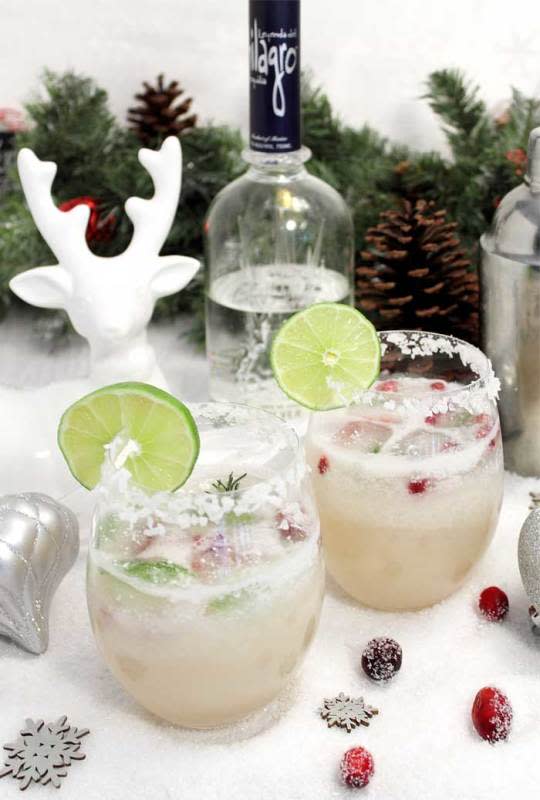 <p>2 Cookin Mommas</p><p>This margarita has all the traditional flavors plus white cranberry juice and coconut.</p><p><strong>Get The Recipe: <a href="https://2cookinmamas.com/white-christmas-margarita/" rel="nofollow noopener" target="_blank" data-ylk="slk:White Christmas Margarita;elm:context_link;itc:0;sec:content-canvas" class="link ">White Christmas Margarita</a></strong></p>
