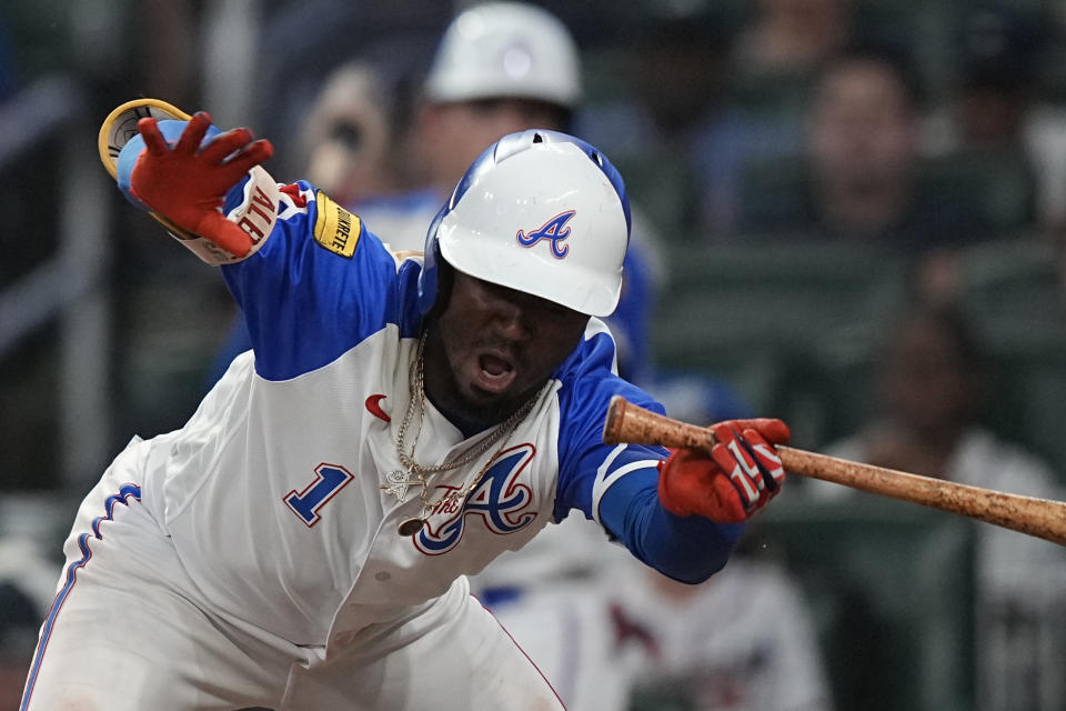 Atlanta Braves' Ozzie Albies (1) jumps back at bat in the third inning of a baseball game against the Pittsburgh Pirates, Saturday, Sept. 9, 2023, in Atlanta. (AP Photo/Brynn Anderson)