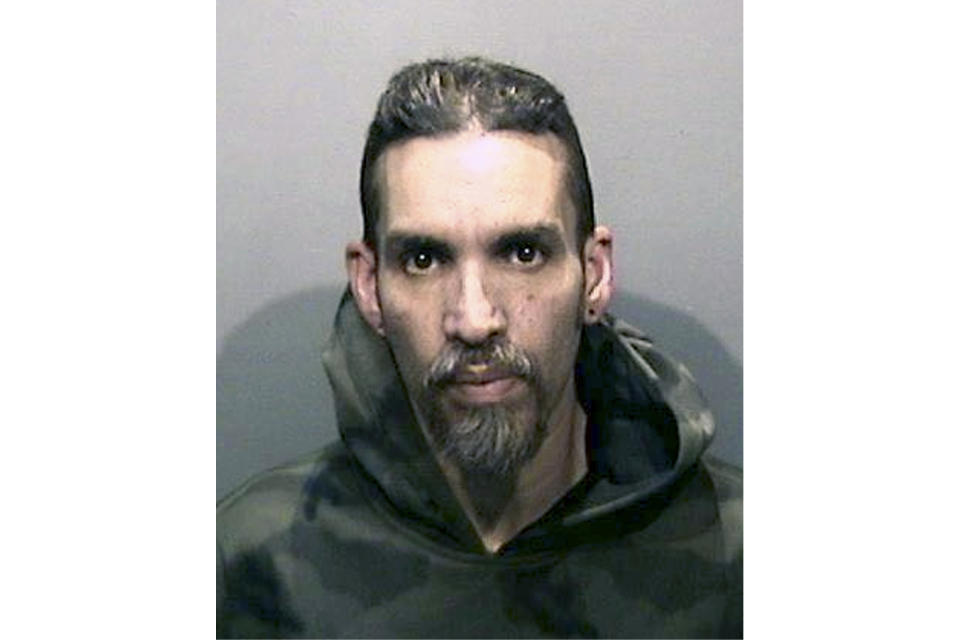 FILE - This Monday, June 5, 2017, file photo released by the Alameda County Sheriff's Office shows Derick Almena at Santa Rita Jail in Alameda County, Calif. Almena awaiting retrial in a fire that killed 36 partygoers at a San Francisco Bay Area warehouse was released from jail Monday, May 4, 2020, because of the coronavirus outbreak. Almena, 50, was released from the Santa Rita Jail after a teleconference hearing Monday, the Alameda County Sheriff's office said. (Alameda County Sheriff's Office via AP, File)