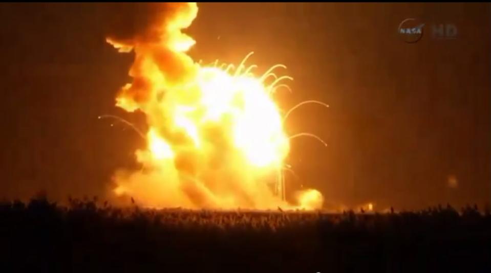 An unmanned Antares rocket is seen exploding seconds after lift off from a commercial launch pad in this still image from NASA video at Wallops Island, Virginia October 28, 2014. The 14-story rocket, built and launched by Orbital Sciences Corp, bolted off its seaside launch pad at the Wallops Flight Facility at 6:22 p.m. EDT/2222 GMT. It exploded seconds later. The cause of the accident was not immediately available. REUTERS/NASA TV/Handout via Reuters (UNITED STATES - Tags: SCIENCE TECHNOLOGY DISASTER TPX IMAGES OF THE DAY) FOR EDITORIAL USE ONLY. NOT FOR SALE FOR MARKETING OR ADVERTISING CAMPAIGNS. THIS IMAGE HAS BEEN SUPPLIED BY A THIRD PARTY. IT IS DISTRIBUTED, EXACTLY AS RECEIVED BY REUTERS, AS A SERVICE TO CLIENTS