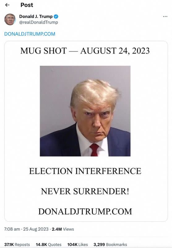 A post by former U.S. President Donald Trump of his police booking mugshot