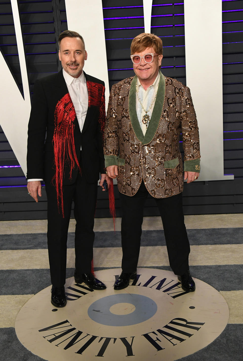 Elton John and David Furnish at the Vanity Fair Oscars 2019 after party