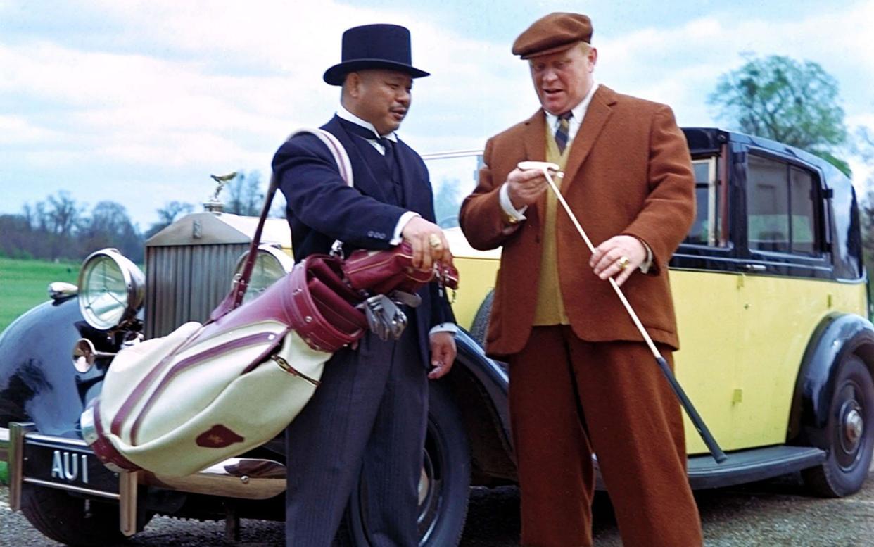 Harold Sakata and Gert Fröbe in Goldfinger