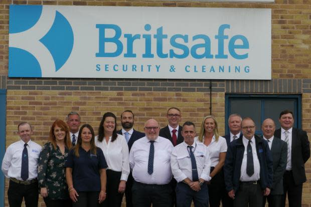 Britsafe employees with managing director Paul Cody (centre front wearing glasses).