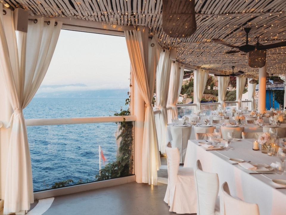 A wedding reception with views of the ocean.