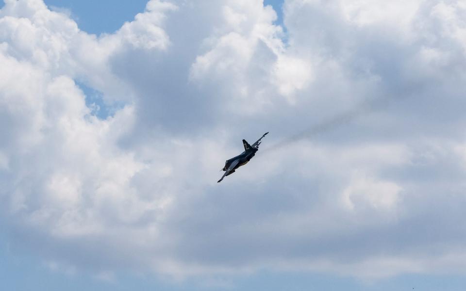 A Russian Sukhoi Su-25 Frogfoot ground-attack plane with a Z sign flies near the settlement of Olenivka in the Donetsk region - REUTERS/Alexander Ermochenko