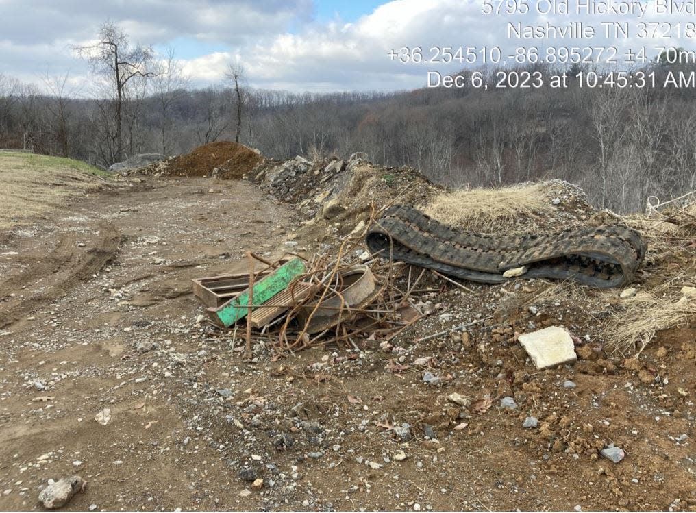 A tangle of rebar and discarded tire tread from large machinery were dumped at a property on Old Hickory Boulevard near Beaman Park in Nashville, as shown in Tennessee Department of Environment and Conservation inspection records dated Dec. 6, 2023.