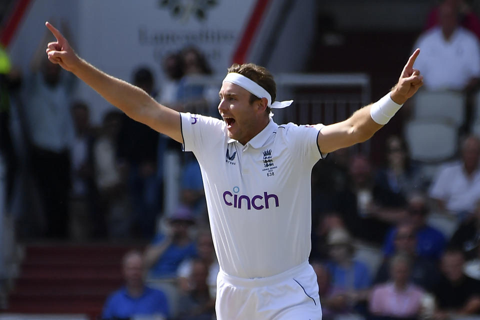England's Stuart Broad celebrates the dismissal of Australia's Travis Head during the first day of the fourth Ashes cricket Test match between England and Australia at Old Trafford in Manchester, England, Wednesday, July 19, 2023. (AP Photo/Rui Vieira)