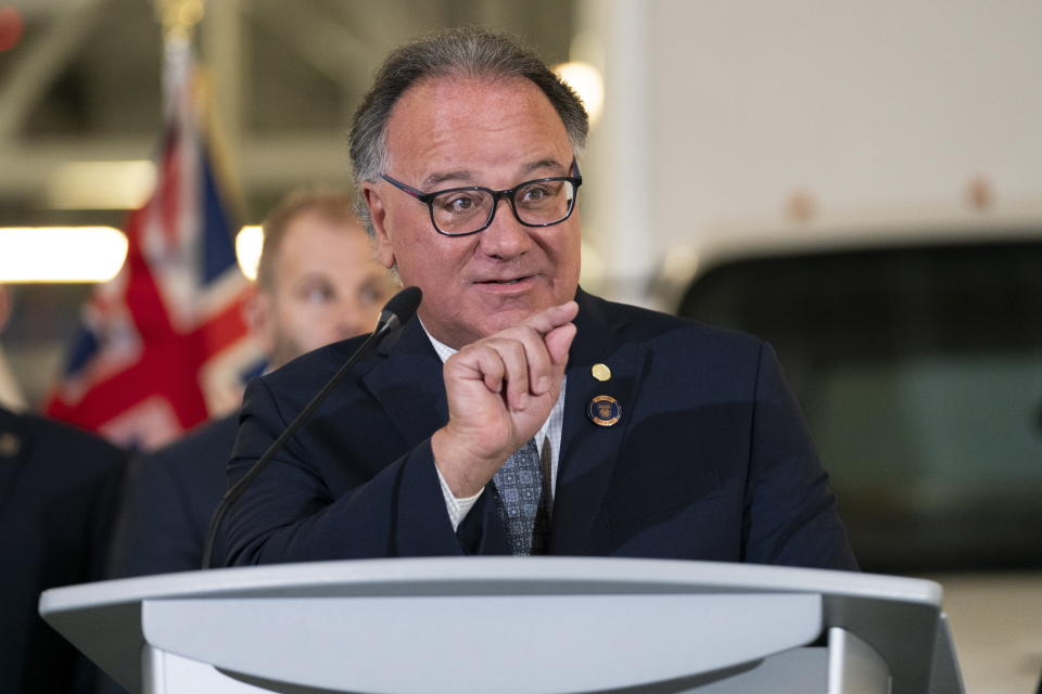 Peel Police Board Chair Nando Iannicca speaks to the media at a press conference regarding Project 24K a joint investigation into the theft of gold from Pearson International Airport, in Brampton, Ontario, on Wednesday, April 17, 2024. (Arlyn McAdorey/The Canadian Press via AP)