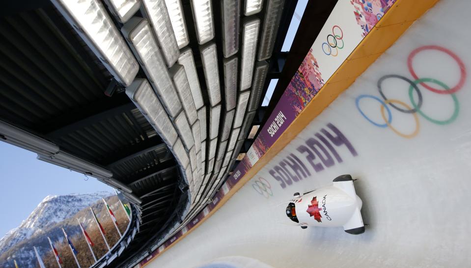 Canada's two-woman bobsleigh pilot Kaillie Humphries speeds down the track during unoffical progressive training at the Sanki sliding center in Rosa Khutor, a venue for the Sochi 2014 Winter Olympics near Sochi, February 6, 2014. REUTERS/Fabrizio Bensch (RUSSIA - Tags: SPORT BOBSLEIGH OLYMPICS)