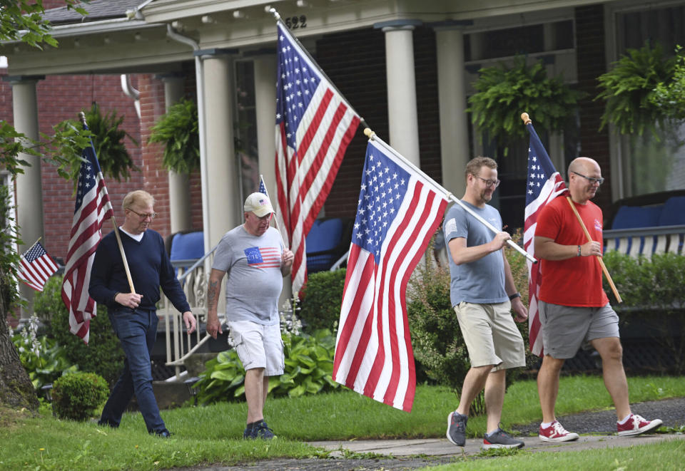 Residents take part in the second annual Independence Day celebration and flag parade in the Westmont suburb of Johnstown, Pa., Tuesday, July 4, 2023.(John Rucosky/The Tribune-Democrat via AP)