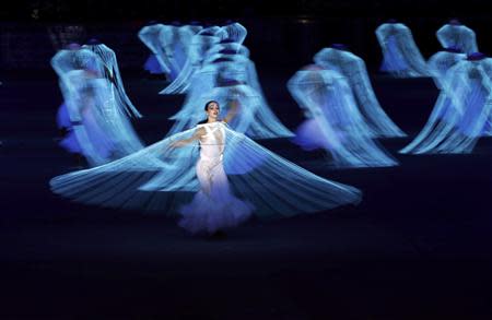 Performers participate in the opening ceremony of the 2014 Sochi Winter Olympics, February 7, 2014. REUTERS/Phil Noble