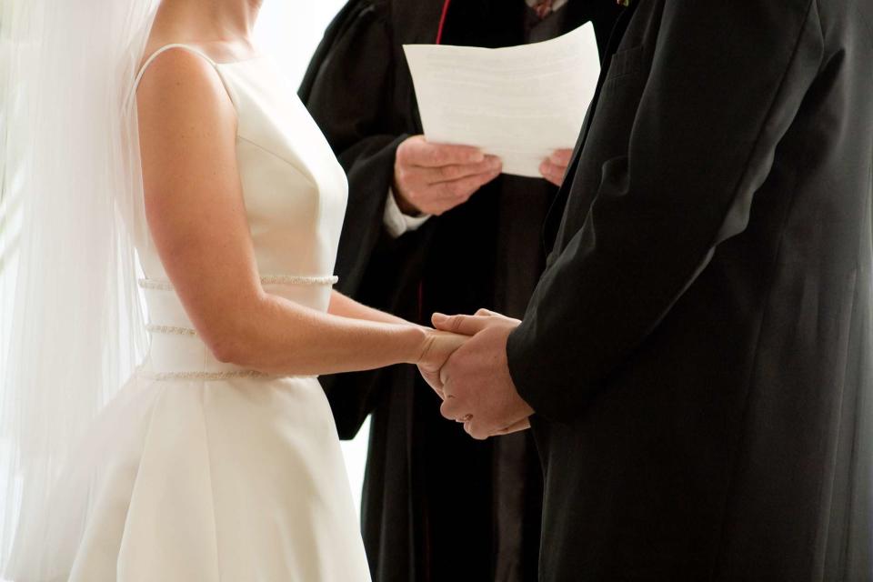 <p>Getty</p> Bride and Groom at wedding