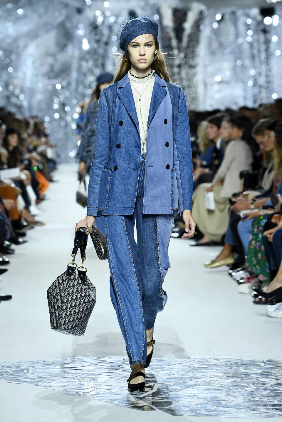 <p>In recent seasons, Dior has swayed more towards a modern feminine aesthetic. However, for SS18, Maria Grazia Chiuri drew upon the archives and adolescence to bring back a dash of 90s double denim.<br><em>[Photo: Getty]</em> </p>