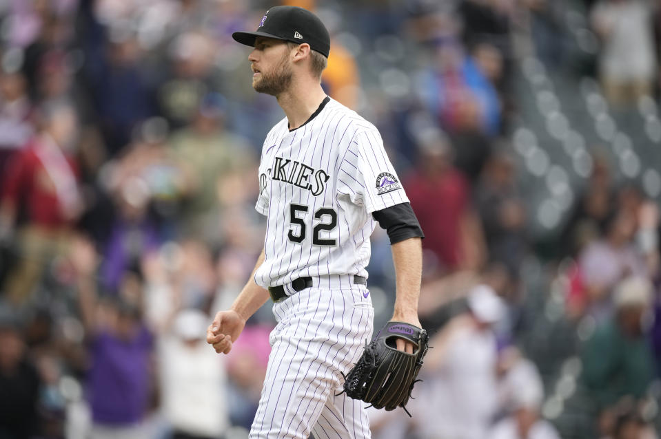 Colorado Rockies relief pitcher Daniel Bard reacts after striking out Arizona Diamondbacks pinch-hitter Ketel Marte to end the ninth inning of a baseball game Saturday, May 22, 2021, in Denver. The Rockies won 7-6. (AP Photo/David Zalubowski)