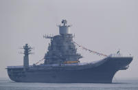 Modified kiev-class Indian aircraft carrier Vikramaditya is seen during the International Fleet Review in Vishakapatnam, India, Saturday, Feb. 6, 2016. India is preparing to relaunch INS Vikramaditya aircraft carrier after a major refit, a critical step toward fulfilling its plan to deploy two carrier battle groups as it seeks to strengthen its regional maritime power to counter China's increasing assertiveness. (AP Photo/Saurabh Das)