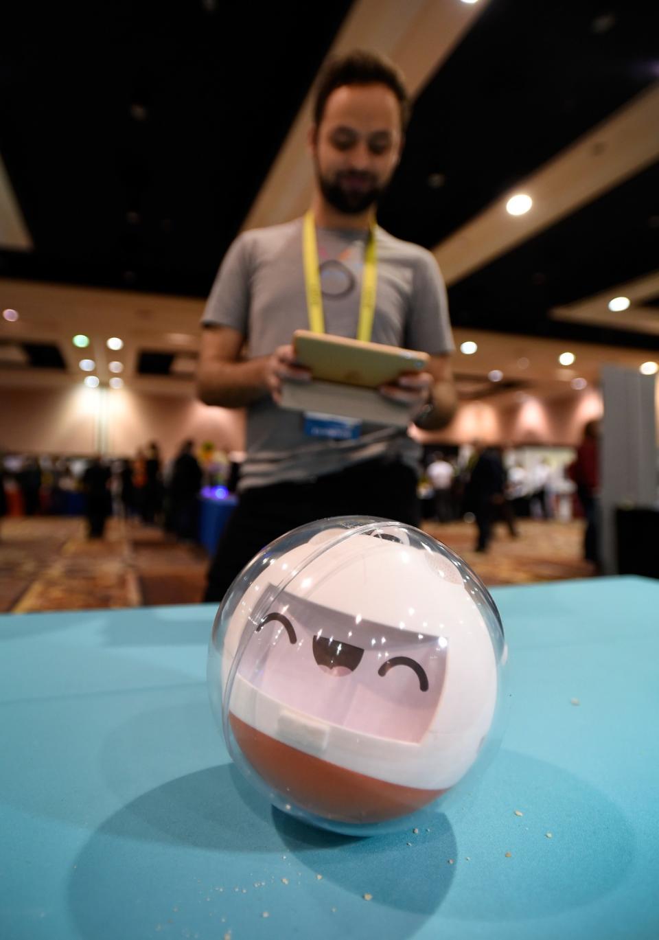 <p>Gareth Dys of Leka Inc., demostrates the robotic smart toy Leka during a press event for CES 2017 at the Mandalay Bay Convention Center on January 3, 2017 in Las Vegas, Nevada. The toy is designed to help children with special needs improve their fine motor skills and social skills, through games and interactive responses. (Getty) </p>