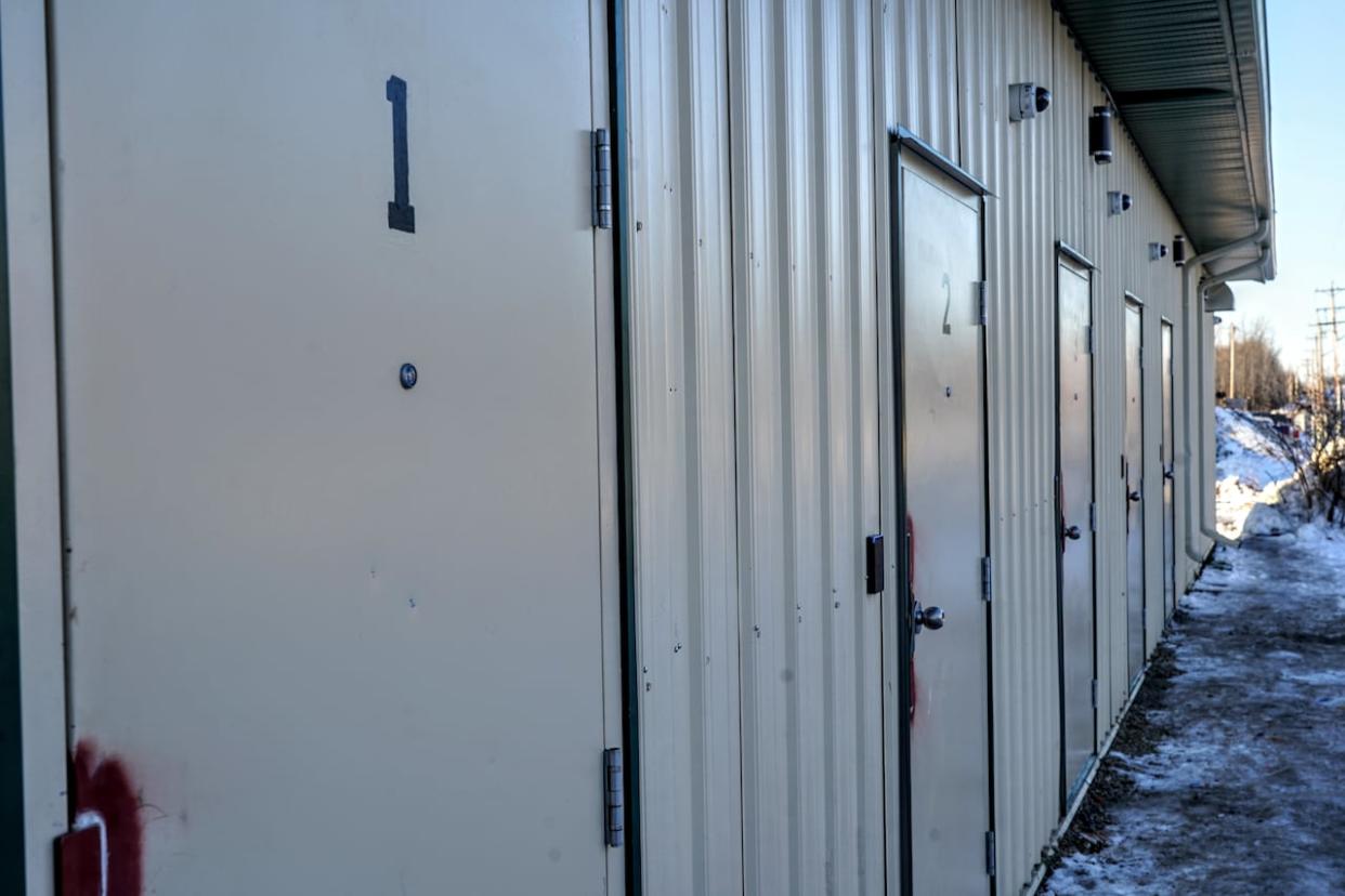 Proponents of the pods say they give unhoused residents a safe, warm place to sleep. (Kory Siegers/CBC - image credit)