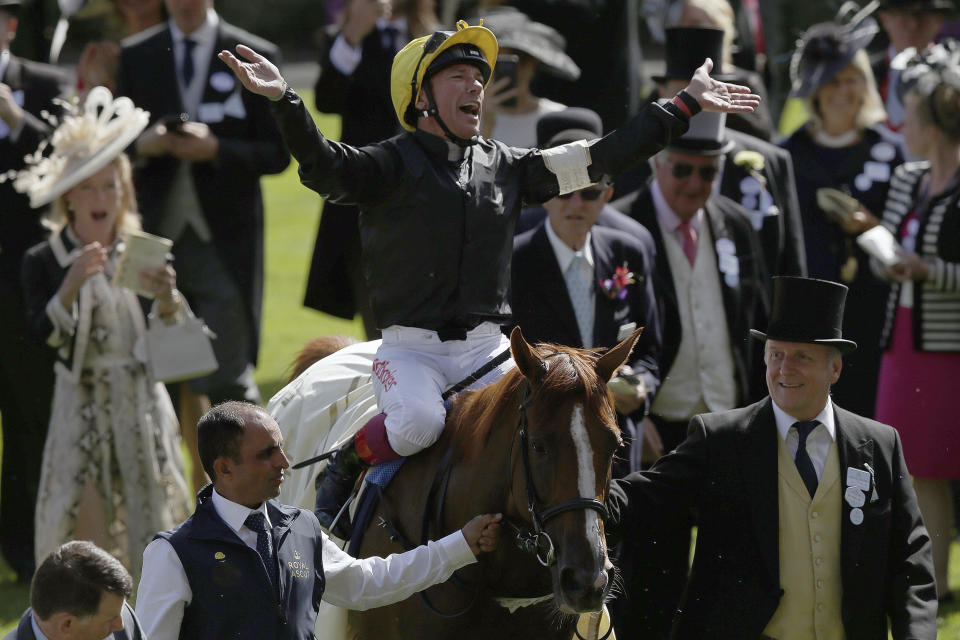 Frankie Dettori riding Stradivarius celebrates winning the Gold Cup on the third day of the Royal Ascot horse race meeting, which is traditionally known as Ladies Day (AP Photo/Tim Ireland)