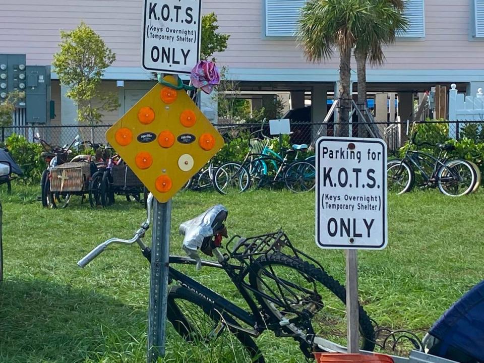 Signs designate parking for the city of Key West’s overnight homeless shelter on Sept. 24, 2020.