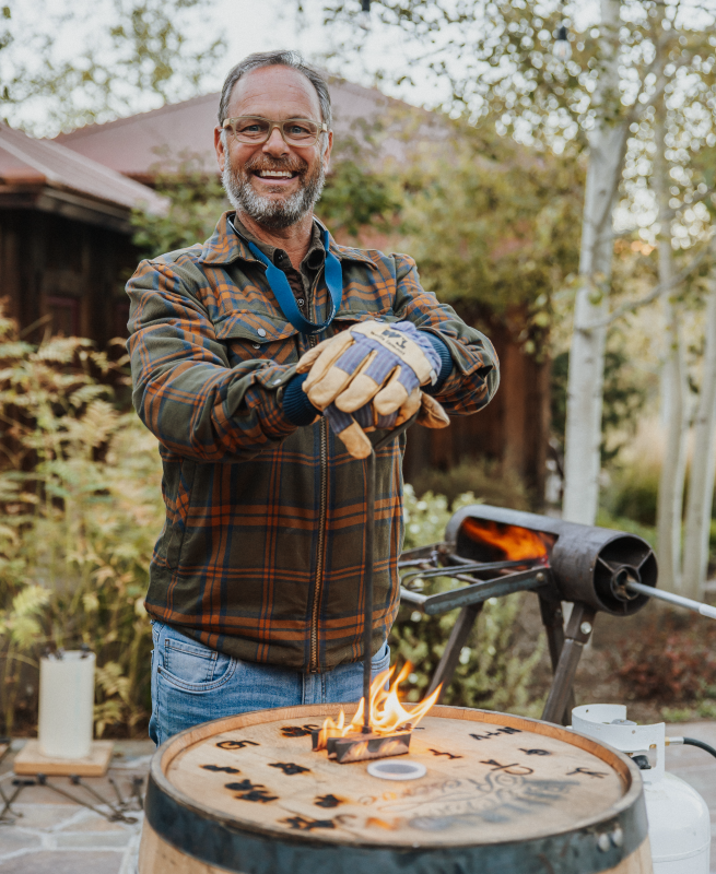 Trey Zoeller branding a barrel of Jefferson's: "What I really try to do is put stories in bottles."<p>Courtesy Image</p>